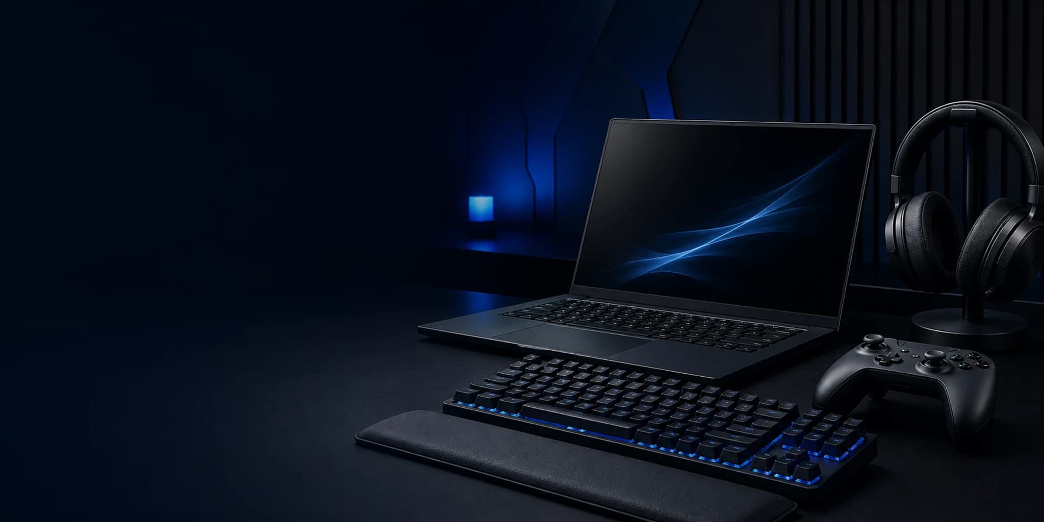 Premium gaming laptop, keyboard, controller and headset setup